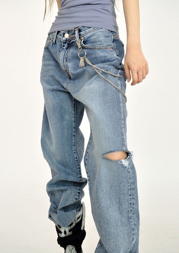 side damaged jeans